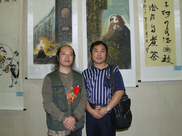 和中央电视台书画院副院长李鸣泉合影.jpg